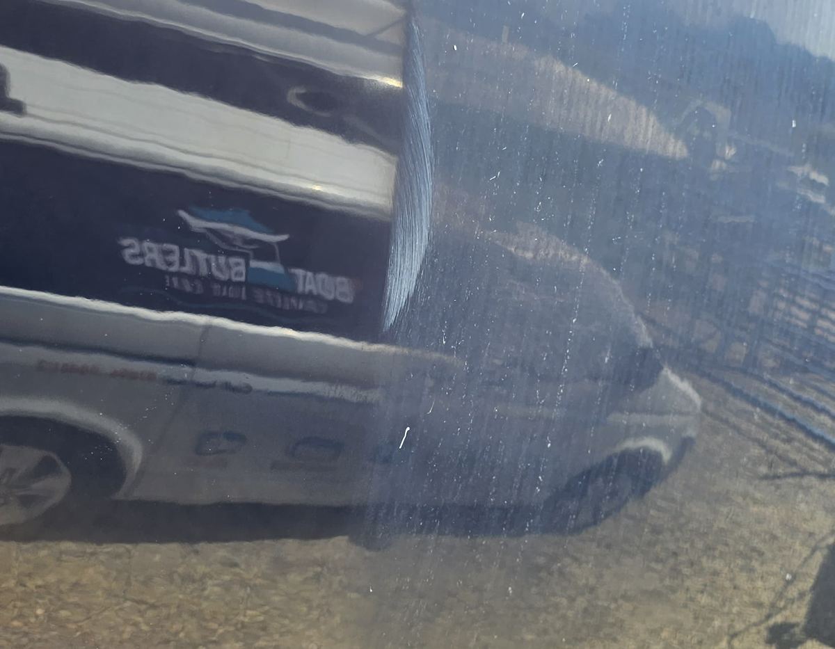 Crystal clear reflection in boat surface